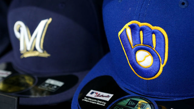 MILWAUKEE, WI - APRIL 24: Baseball hats with the current logo, left, and retro logo sit on display at Miller Park on April 24, 2016 in Milwaukee, Wisconsin. *** Local Caption ***