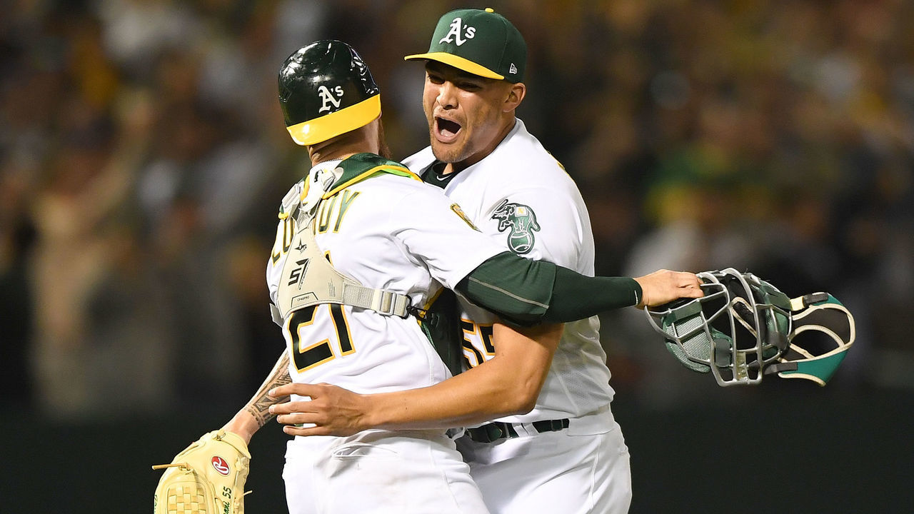 OAKLAND, CA - APRIL 21: Sean Manaea #55 and Jonathan Lucroy #21 of the Oakland Athletics celebrates after Manaea pitched a no-hitter against the Boston Red Sox at the Oakland Alameda Coliseum on April 21, 2018 in Oakland, California. The Athletics won the game 3-0.