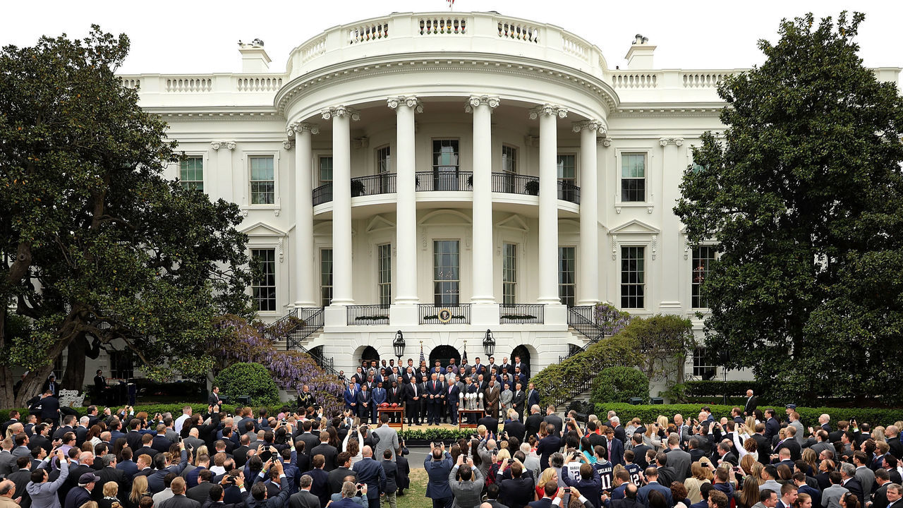 WASHINGTON, DC - APRIL 19: U.S. President Donald Trump poses for photographs with the New England Patriots during a celebration of the team's Super Bowl victory on the South Lawn at the White House April 19, 2017 in Washington, DC. It was the team's fifth Super Bowl victory since 1960.