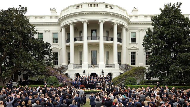WASHINGTON, DC - APRIL 19: U.S. President Donald Trump poses for photographs with the New England Patriots during a celebration of the team's Super Bowl victory on the South Lawn at the White House April 19, 2017 in Washington, DC. It was the team's fifth Super Bowl victory since 1960.