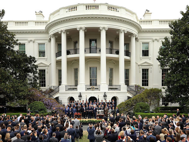 WASHINGTON, DC - APRIL 19: U.S. President Donald Trump poses for photographs with the New England Patriots during a celebration of the team's Super Bowl victory on the South Lawn at the White House April 19, 2017 in Washington, DC. It was the team's fifth Super Bowl victory since 1960.