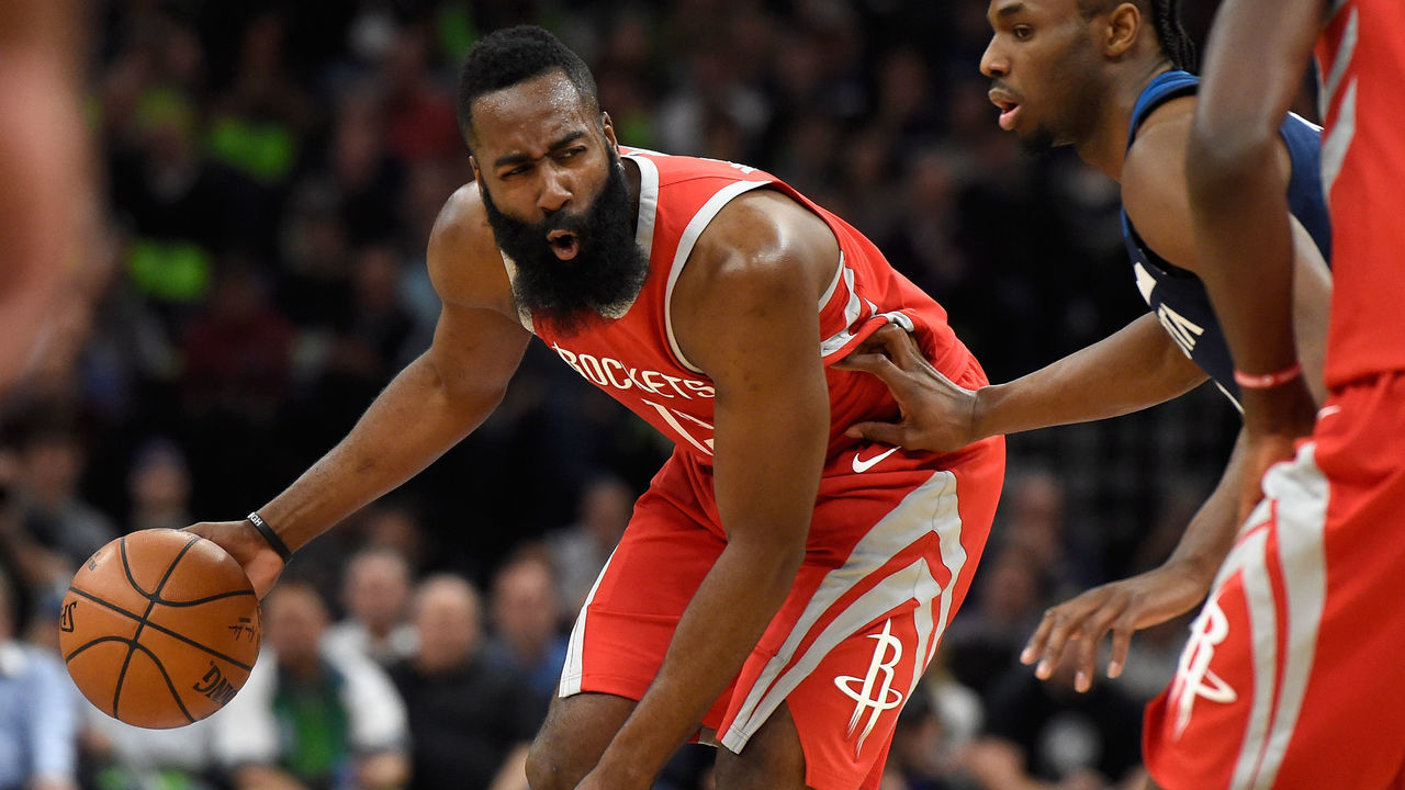 MINNEAPOLIS, MN - APRIL 23: James Harden #13 of the Houston Rockets dribbles the ball against Andrew Wiggins #22 of the Minnesota Timberwolves during the first quarter in Game Four of Round One of the 2018 NBA Playoffs on April 23, 2018 at the Target Center in Minneapolis, Minnesota.