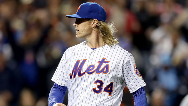 NEW YORK, NY - MAY 17: Noah Syndergaard #34 of the New York Mets reacts after striking out Bryce Harper of the Washington Nationals in the sixth inning at Citi Field on May 17, 2016 in the Flushing neighborhood of the Queens borough of New York City.