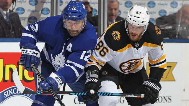 TORONTO, ON - APRIL 23: Kevan Miller #86 of the Boston Bruins skates against Patrick Marleau #12 of the Toronto Maple Leafs in Game Six of the Eastern Conference First Round in the 2018 Stanley Cup Play-offs at the Air Canada Centre on April 23, 2018 in Toronto, Ontario, Canada. The Maple Leafs defeated the Bruins 3-1. *** Local Caption *** Kevan Miller; Patrick Marleau