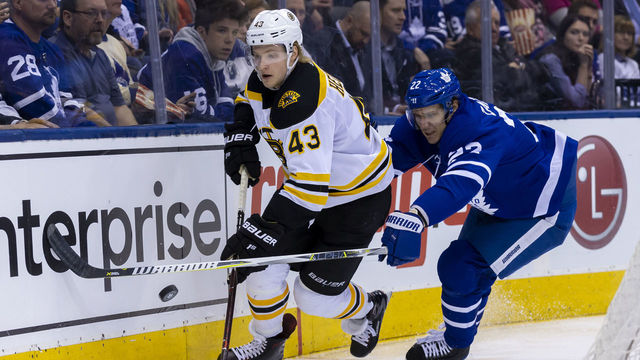 TORONTO, ON - APRIL 19: Nikita Zaitsev #22 of the Toronto Maple Leafs chases Danton Heinen #43 of the Boston Bruins in Game Four of the Eastern Conference First Round during the 2018 NHL Stanley Cup Playoffs at the Air Canada Centre on April 19, 2018 in Toronto, Ontario, Canada.