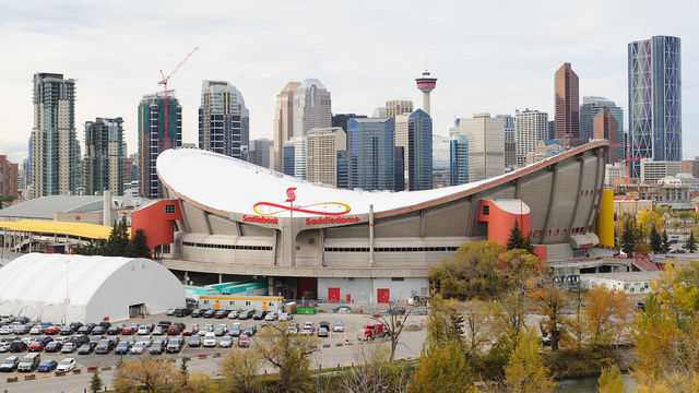 CALGARY, AB - OCTOBER 6: A general view of the exterior of the Scotiabank Saddledome with the Calgary skyline behind prior to the Flames' home opening NHL game against the Vancouver Canucks during at Scotiabank Saddledome on October 6, 2013 in Calgary, Alberta, Canada.