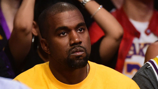 LOS ANGELES, CA - APRIL 13: Kanye West looks on as he watches as the Los Angeles Lakers take on the Utah Jazz at Staples Center on April 13, 2016 in Los Angeles, California.
