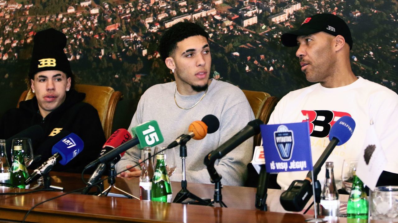 US basketball player (L-R) LaMelo Ball, LiAngelo Ball and their father LaVar Ball attend a press conference in Prienai, Lithuania, where they will play for the Vytautas club on January 5, 2018. Basketball-crazed Lithuania welcomed LiAngelo and LaMelo Ball, the two youngest sons of flamboyant Los Angeles entrepreneur LaVar Ball who recently made headlines due to a feud with US President Donald Trump. / AFP PHOTO / Petras Malukas