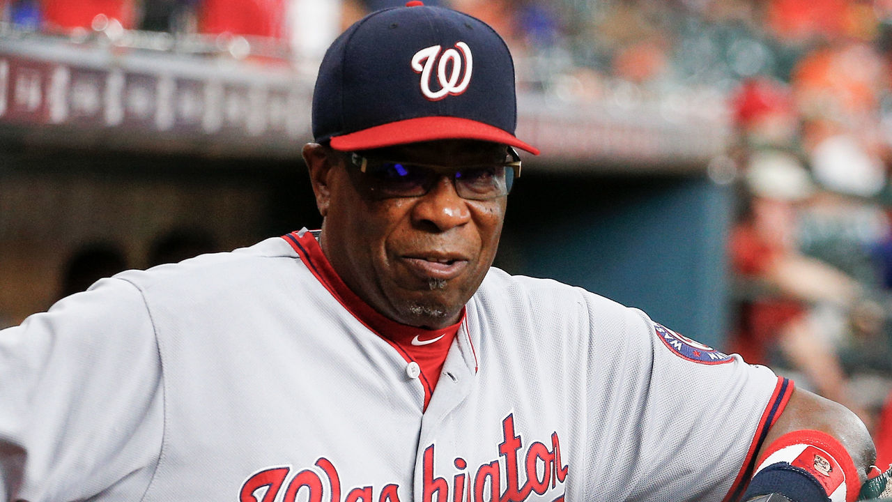 HOUSTON, TX - AUGUST 24: Manager Dusty Baker #12 of the Washington Nationals looks on from the dugout against the Houston Astros at Minute Maid Park on August 24, 2017 in Houston, Texas.