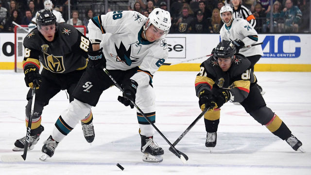 LAS VEGAS, NV - MARCH 31: Timo Meier #28 of the San Jose Sharks skates with the puck under pressure from Nate Schmidt #88 and Jonathan Marchessault #81 of the Vegas Golden Knights in the first period of their game at T-Mobile Arena on March 31, 2018 in Las Vegas, Nevada. The Golden Knights won 3-2 and clinched the Pacific Division title.