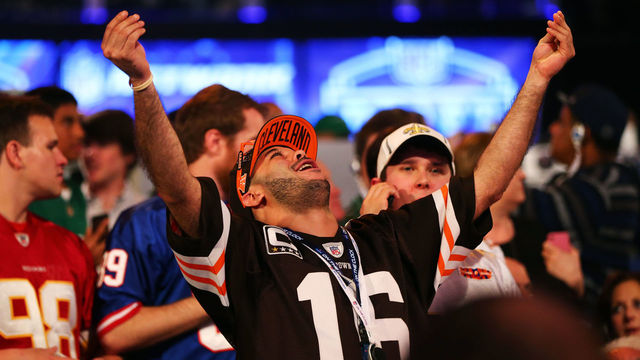 NEW YORK, NY - MAY 08: A fan reacts as Johnny Manziel of the Texas A&M Aggies is picked #22 overall by the Cleveland Browns during the first round of the 2014 NFL Draft at Radio City Music Hall on May 8, 2014 in New York City.