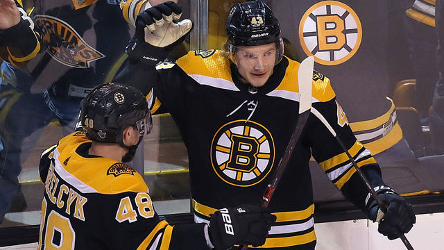 BOSTON, MA - APRIL 25: Boston Bruins Danton Heinen, right, celebrates his goal with Matt Grzelcyk, left, during the first period. The Boston Bruins host the Toronto Maple Leafs in Game 7 of the Eastern Conference First Round during the 2018 NHL Stanley Cup Playoffs at the TD Garden in Boston on April 25, 2018.