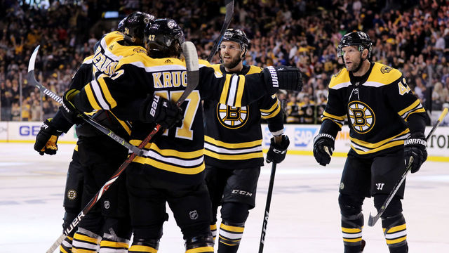 BOSTON, MA - APRIL 25: Jake DeBrusk #74 of the Boston Bruins celebrates with Torey Krug #47, David Backes #42 and David Krejci #46 after scoring a goal against the Toronto Maple Leafs during the first period of Game Seven of the Eastern Conference First Round in the 2018 Stanley Cup play-offs at TD Garden on April 25, 2018 in Boston, Massachusetts.