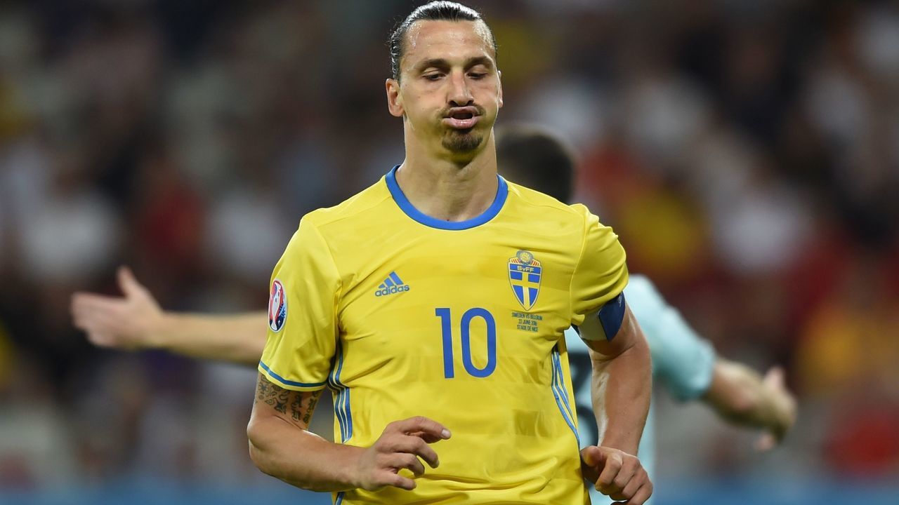 Sweden's forward Zlatan Ibrahimovic reacts during the Euro 2016 group E football match between Sweden and Belgium at the Allianz Riviera stadium in Nice on June 22, 2016. / AFP PHOTO / BULENT KILIC