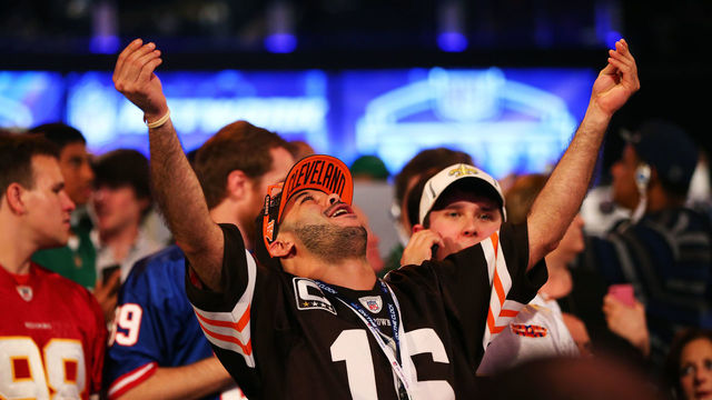 NEW YORK, NY - MAY 08: A fan reacts as Johnny Manziel of the Texas A&M Aggies is picked #22 overall by the Cleveland Browns during the first round of the 2014 NFL Draft at Radio City Music Hall on May 8, 2014 in New York City.