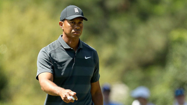 AUGUSTA, GA - APRIL 05: Tiger Woods of the United States waves on the eighth green during the first round of the 2018 Masters Tournament at Augusta National Golf Club on April 5, 2018 in Augusta, Georgia.