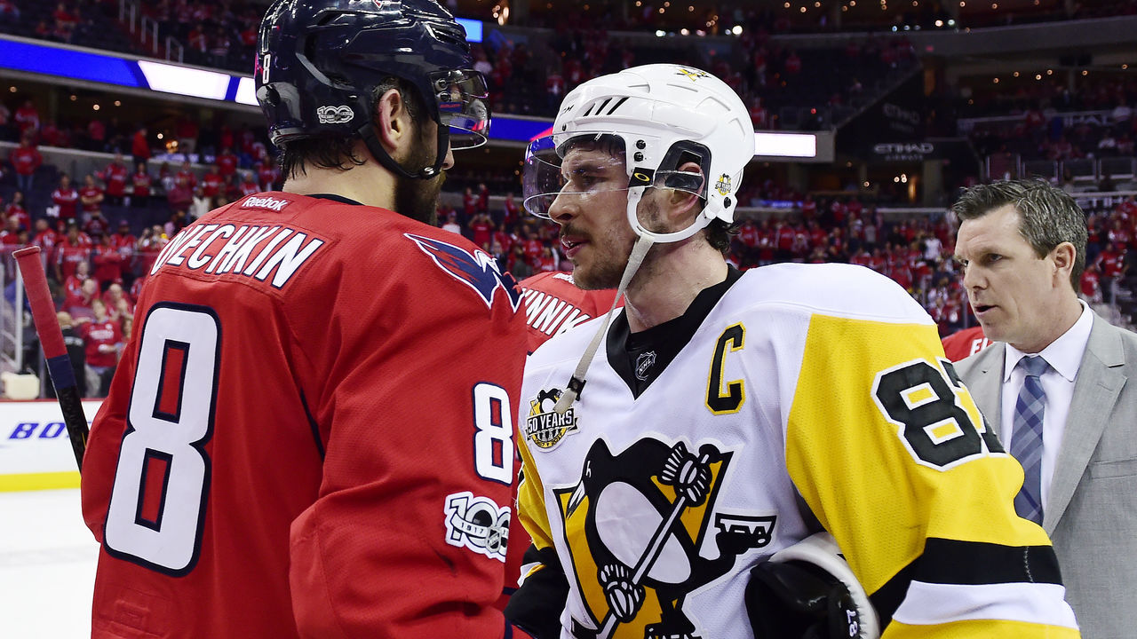 WASHINGTON, DC - MAY 10: Alex Ovechkin #8 of the Washington Capitals and Sidney Crosby #87 of the Pittsburgh Penguins shake hands after the Penguins defeated the Capitals 2-0 in Game Seven of the Eastern Conference Second Round during the 2017 NHL Stanley Cup Playoffs at Verizon Center on May 10, 2017 in Washington, DC.