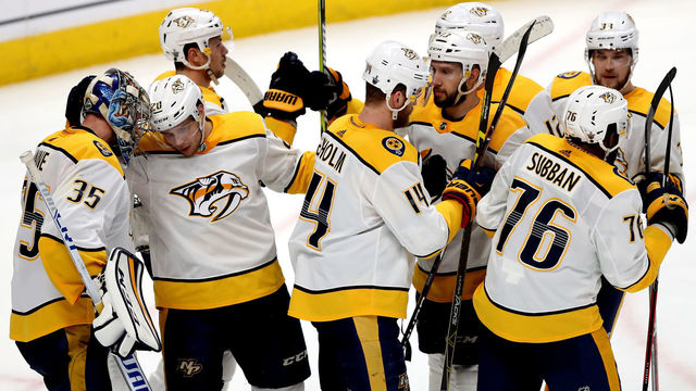 DENVER, CO - APRIL 22: Members of the Nashville Predators celebrate their win over the Colorado Avalanche in Game Six of the Western Conference First Round during the 2018 NHL Stanley Cup Playoffs at the Pepsi Center on April 22, 2018 in Denver, Colorado.