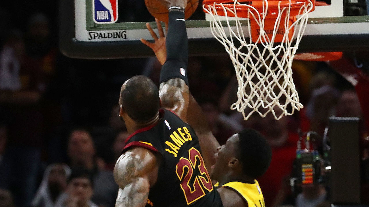 CLEVELAND, OH - APRIL 25: LeBron James #23 of the Cleveland Cavaliers blocks the shot of Victor Oladipo #4 of the Indiana Pacers late Game Five of the Eastern Conference Quarterfinals during the 2018 NBA Playoffs at Quicken Loans Arena on April 25, 2018 in Cleveland, Ohio. Cleveland won the game 98-95 to take a 3-2 series lead.
