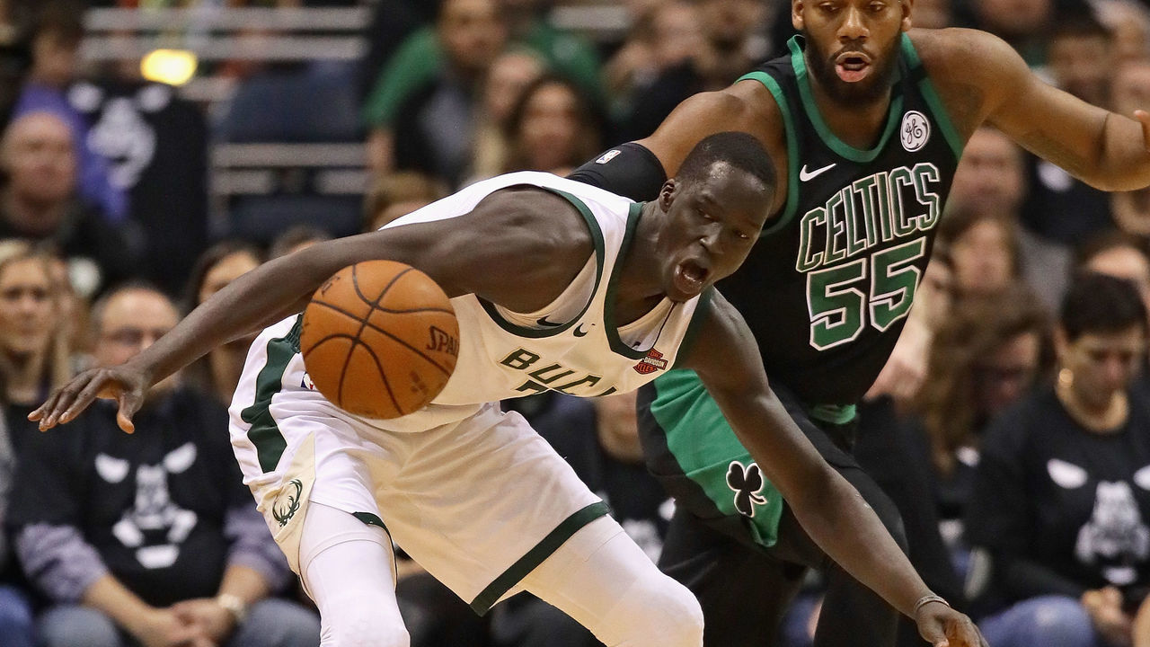 MILWAUKEE, WI - APRIL 22: Thon Maker #7 of the Milwaukee Bucks looses control of the ball under pressure from Greg Monroe #55 of the Boston Celtics during Game Four of Round One of the 2018 NBA Playoffs at the Bradley Center on April 22, 2018 in Milwaukee, Wisconsin.