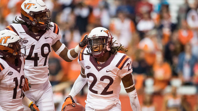 SYRACUSE, NY - OCTOBER 15: Terrell Edmunds #22 of the Virginia Tech Hokies celebrates an interception in the Syracuse Orange endzone during the second half on October 15, 2016 at The Carrier Dome in Syracuse, New York.