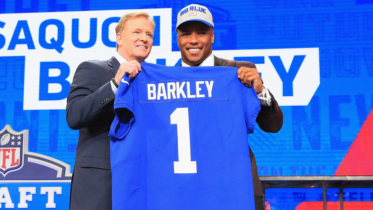 ARLINGTON, TX - APRIL 26: Saquon Barkley of Penn State poses with NFL Commissioner Roger Goodell after being picked #2 overall by the New York Giants during the first round of the 2018 NFL Draft at AT&T Stadium on April 26, 2018 in Arlington, Texas.