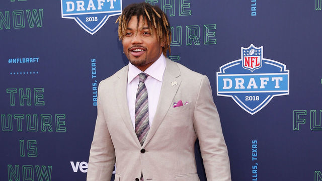 ARLINGTON, TX - APRIL 26: Derrius Guice of LSU poses on the red carpet prior to the start of the 2018 NFL Draft at AT&T Stadium on April 26, 2018 in Arlington, Texas.