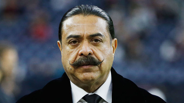 HOUSTON, TX - DECEMBER 28: Shahid Khan, the billionaire owner of the Jacksonville Jaguars, waits on the field before their game against the Houston Texans at NRG Stadium on December 28, 2014 in Houston, Texas.