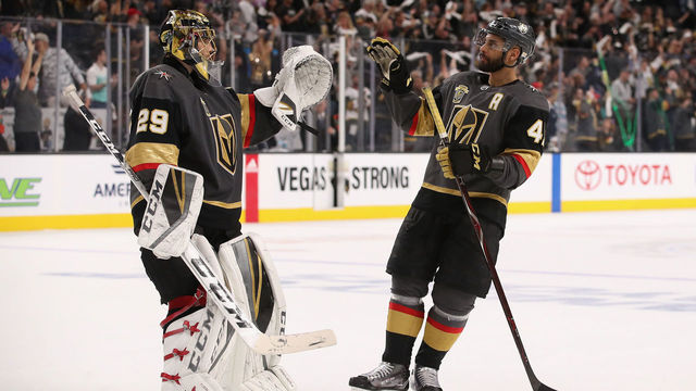 GLENDALE, NV - APRIL 26: Goaltender Marc-Andre Fleury #29 of the Vegas Golden Knights is congratulated by Pierre-Edouard Bellemare #41 after defeating the San Jose Sharks in Game One of the Western Conference Second Round during the 2018 NHL Stanley Cup Playoffs at T-Mobile Arena on April 26, 2018 in Las Vegas, Nevada. The Golden Knights defeated the Sharks 7-0.