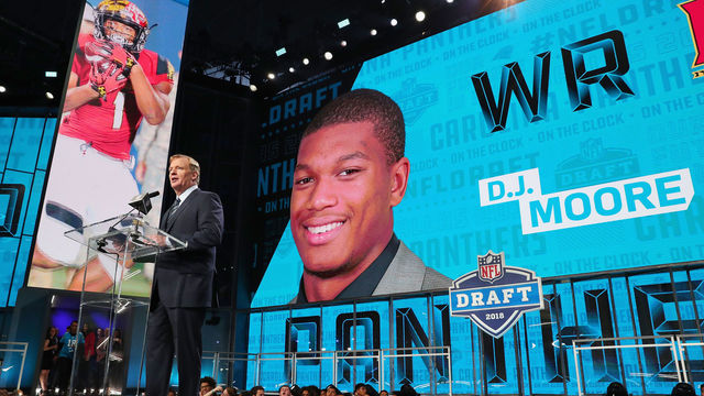 ARLINGTON, TX - APRIL 26: A video board displays an image of D.J. Moore of Maryland after he was picked #24 overall by the Carolina Panthers during the first round of the 2018 NFL Draft at AT&T Stadium on April 26, 2018 in Arlington, Texas.