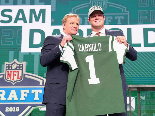 ARLINGTON, TX - APRIL 26: Sam Darnold of USC poses with NFL Commissioner Roger Goodell after being picked #3 overall by the New York Jets during the first round of the 2018 NFL Draft at AT&T Stadium on April 26, 2018 in Arlington, Texas.
