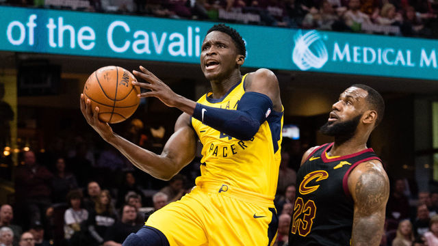 CLEVELAND, OH - APRIL 18: Victor Oladipo #4 of the Indiana Pacers shoots over LeBron James #23 of the Cleveland Cavaliers during the second half of Game 2 of the first round of the Eastern Conference playoffs at Quicken Loans Arena on April 18, 2018 in Cleveland, Ohio. The Cavaliers defeated the Pacers 100-97.