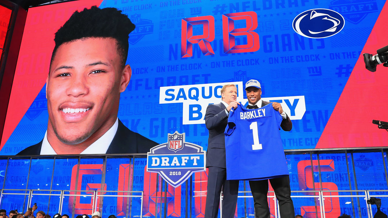 ARLINGTON, TX - APRIL 26: Saquon Barkley of Penn State poses with NFL Commissioner Roger Goodell after being picked #2 overall by the New York Giants during the first round of the 2018 NFL Draft at AT&T Stadium on April 26, 2018 in Arlington, Texas.