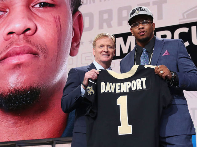 ARLINGTON, TX - APRIL 26: Marcus Davenport of UTSA poses with NFL Commissioner Roger Goodell after being picked #14 overall by the New Orleans Saints during the first round of the 2018 NFL Draft at AT&T Stadium on April 26, 2018 in Arlington, Texas.