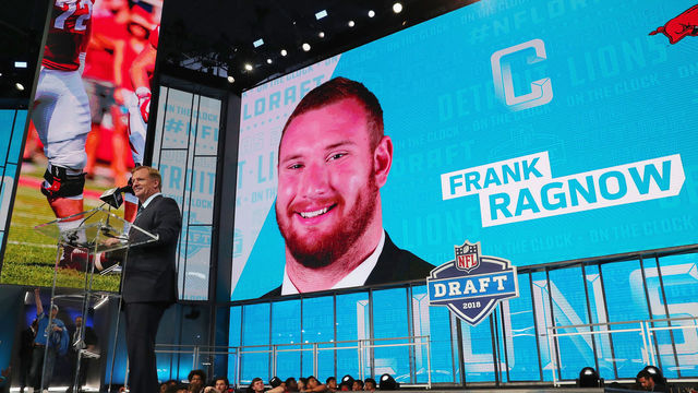 ARLINGTON, TX - APRIL 26: A video board displays an image of Frank Ragnow of Arkansas after he was picked #20 overall by the Detroit Lions during the first round of the 2018 NFL Draft at AT&T Stadium on April 26, 2018 in Arlington, Texas.
