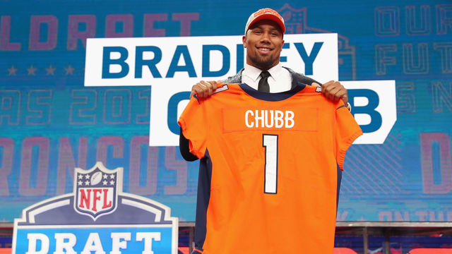 ARLINGTON, TX - APRIL 26: Bradley Chubb of NC State poses after being picked #5 overall by the Denver Broncos during the first round of the 2018 NFL Draft at AT&T Stadium on April 26, 2018 in Arlington, Texas.