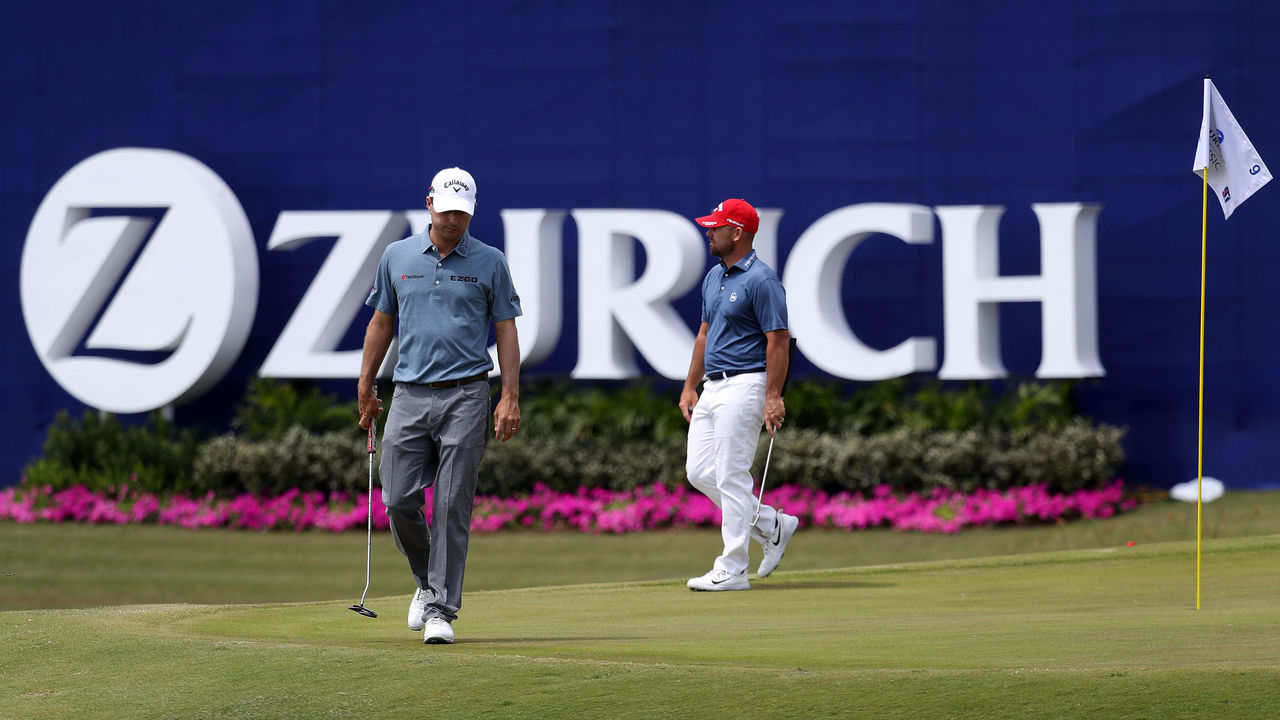 AVONDALE, LA - APRIL 28: Kevin Kisner and Scott Brown walk onto the ninth green during the third round of the Zurich Classic at TPC Louisiana on April 28, 2018 in Avondale, Louisiana.