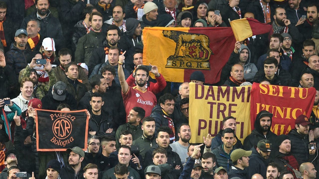 Roma fans look on during the UEFA Champions League first leg semi-final football match between Liverpool and Roma at Anfield stadium in Liverpool, north west England on April 24, 2018.