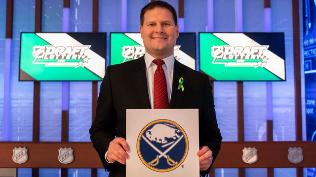 TORONTO, ON - APRIL 28: Buffalo Sabres General Manager Jason Botterill shows off the first overall pick during the NHL Draft Lottery at the CBC Studios on April 28, 2018 in Toronto, Ontario, Canada.