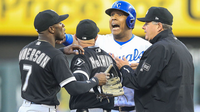 KANSAS CITY, MO - APRIL 28: Salvador Perez #13 of the Kansas City Royals has words with Tim Anderson #7 of the Chicago White Sox at second base during the first inning of game two of a doubleheader at Kauffman Stadium on April 28, 2018 in Kansas City, Missouri.