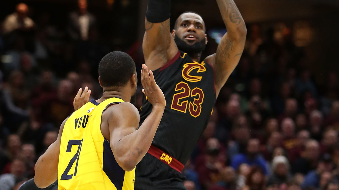 CLEVELAND, OH - APRIL 25: LeBron James #23 of the Cleveland Cavaliers takes a shot over Thaddeus Young #21 of the Indiana Pacers during the second half of Game Five of the Eastern Conference Quarterfinals during the 2018 NBA Playoffs at Quicken Loans Arena on April 25, 2018 in Cleveland, Ohio. Cleveland won the game 98-95 to take a 3-2 series lead.