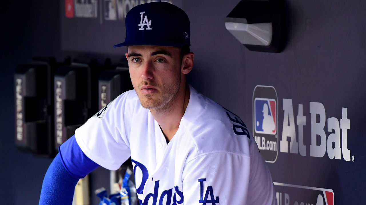 LOS ANGELES, CA - NOVEMBER 01: Cody Bellinger #35 of the Los Angeles Dodgers sits in the dugout before game seven of the 2017 World Series against the Houston Astros at Dodger Stadium on November 1, 2017 in Los Angeles, California.