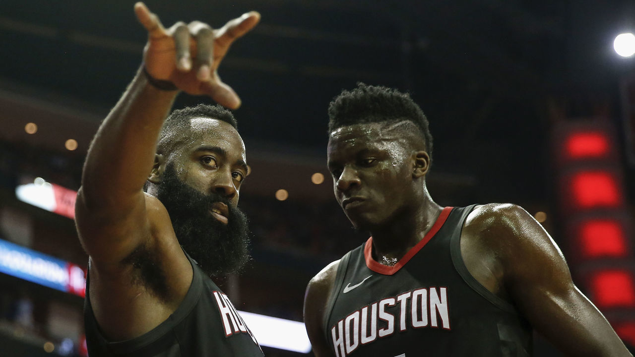 HOUSTON, TX - APRIL 29: James Harden #13 celebrates with teammate Clint Capela #15 of the Houston Rockets during a time out in the second half during Game One of the Western Conference Semifinals of the 2018 NBA Playoffs against the Utah Jazz at Toyota Center on April 29, 2018 in Houston, Texas.
