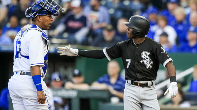 KANSAS CITY, MO - APRIL 28: Salvador Perez #13 of the Kansas City Royals and Tim Anderson #7 of the Chicago White Sox have words after Anderson hit a homerun in the first inning during game two of a doubleheader at Kauffman Stadium on April 28, 2018 in Kansas City, Missouri.