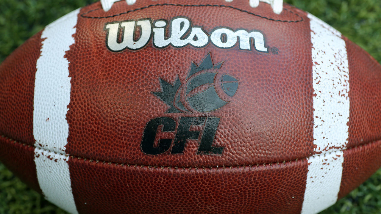 TORONTO, CANADA - JULY 11: A CFL logo on an official Canadian CFL league ball during warm-ups before the Saskatchewan Roughriders CFL game against the Toronto Argonauts on July 11, 2013 at Rogers Centre in Toronto, Ontario, Canada.