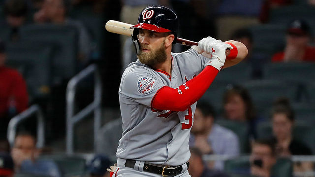 ATLANTA, GA - APRIL 03: Bryce Harper #34 of the Washington Nationals hits a solo homer in the third inning against the Atlanta Braves at SunTrust Park on April 3, 2018 in Atlanta, Georgia.