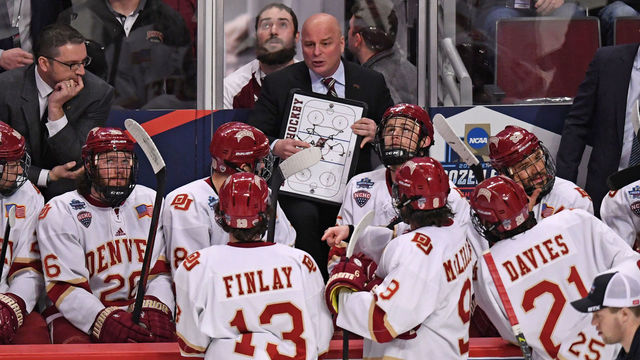 CHICAGO, IL - APRIL 06: Denver Pioneers head coach Jim Montgomery in the first period of an NCAA Frozen Four semifinal game with the Denver Pioneers and the Notre Dame Fighting Irish on April 6, 2017, at the United Center in Chicago, IL.