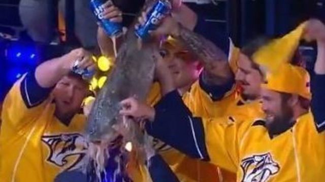 PETA calls out Titans' O-line for drinking from catfish 'corpse' before Preds-Jets Game 2