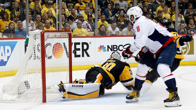 PITTSBURGH, PA - MAY 01: Alex Ovechkin #8 of the Washington Capitals flips the puck past Matt Murray #30 of the Pittsburgh Penguins for the game winning goal during the third period in Game Three of the Eastern Conference Second Round during the 2018 NHL Stanley Cup Playoffs at PPG PAINTS Arena on May 1, 2018 in Pittsburgh, Pennsylvania. Washington defeated Pittsburgh 4-3.