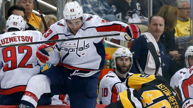 PITTSBURGH, PA - MAY 01: Tom Wilson #43 of the Washington Capitals collides with Zach Aston-Reese #46 of the Pittsburgh Penguins during the second period in Game Three of the Eastern Conference Second Round during the 2018 NHL Stanley Cup Playoffs at PPG PAINTS Arena on May 1, 2018 in Pittsburgh, Pennsylvania.